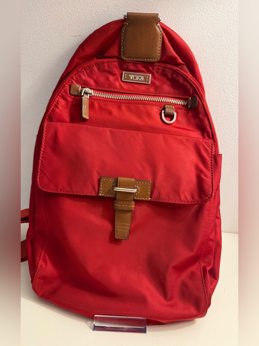 Tumi Voyageur sling bag.